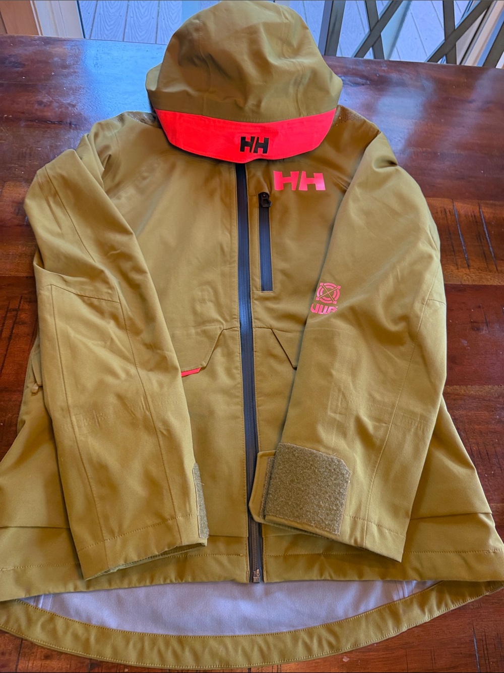 Helly Hansen Jacket with Bright Coral Accents never used